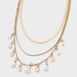 Pearl Charm Multi-Strand Necklace - A New Day™ - Gold/Ivory: Nickel-Free Metal, Lobster Claw Clasp, 16" Length 9 Pearl Charm Multi-Strand Necklace - A New Day™ - Gold/Ivory: Nickel-Free Metal, Lobster Claw Clasp, 16" Length -A New Day™ GUEST 2fcf122e f082 457a 9ca7 a0faa6b115c2